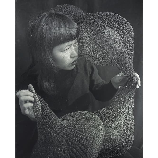 Ruth Asawa holding a Form Within A Form sculpture, 1952. Photograph by Imogen Cunningham. ©2015 The Imogen Cunningham Trust. Artwork: ©Estate of Ruth Asawa.