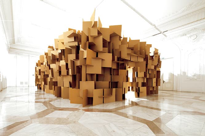 200 prepared dc-motors, 2000 carboard elements 70×70cm Zimoun in collaboration with Architect Hannes Zweifel 2011 ©Zimoun