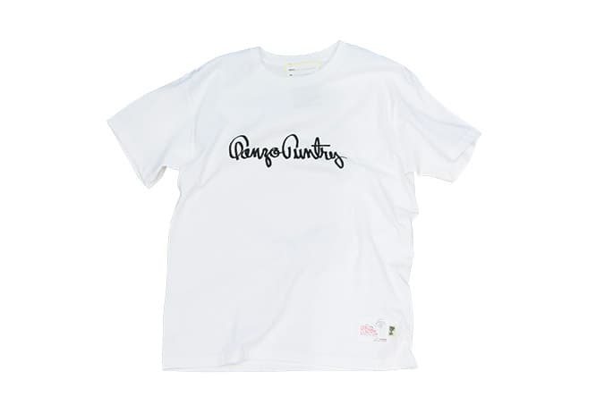 お蔵入りだったタグも、今回初お目見え。　〈ゴンゾーカントリー〉のロゴをモチーフにしたTシャツ。裾部分のタグは、当時使われなかったデザインを初めて形にしたもの。7,000円（ゴンゾーカントリー×SSZ／ビームス 原宿TEL 03 3470 3947）。