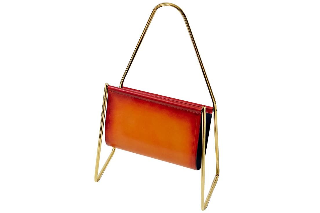 Magazine Rack　こちらもオーボック2世さま1951年のデザイン。真鍮鋳物にヴェネチアレザーの組み合わせ。456,000円。