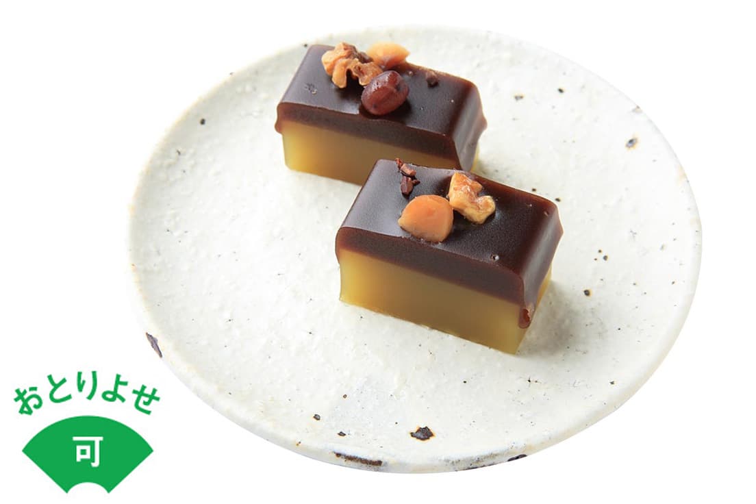 バナナベースの味にカカオの香りと黒糖の甘味をプラスした棹菓子。薄くスライスして味わうのもよい。1本1,100円。