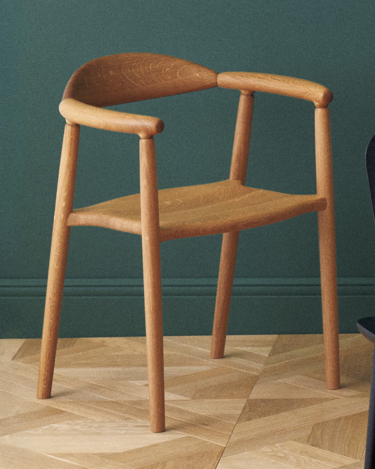 《Musubi Armchair》背と肘の結んだよな接合部が特徴。104,500円〜。