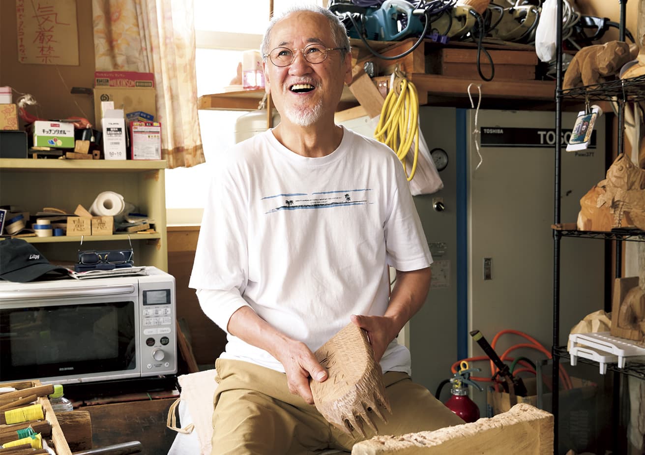 Mr. Sato Kenji has been carving bears for 54 years.