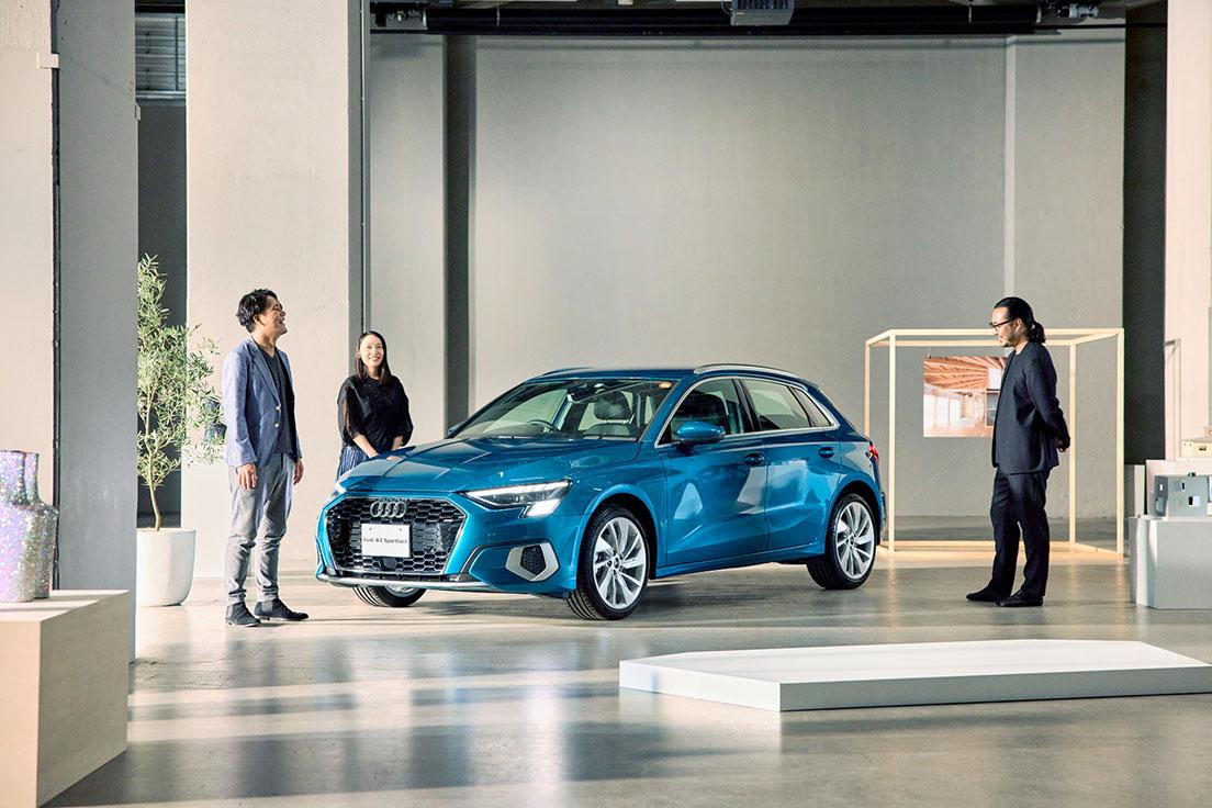 スポーティなデザインの新型《Audi A3 Sportback》を囲む3人。左から／横関亮太、岡野道子、舘鼻則孝。